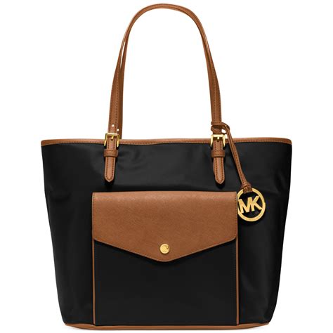 michael kors jet set black large travel east west tote|Michael Kors multifunction tote.